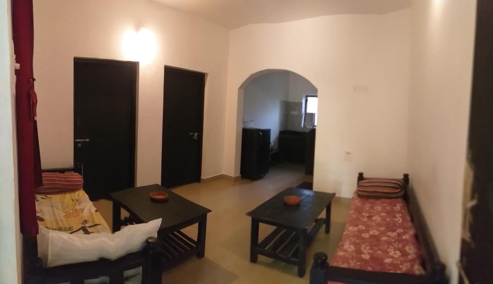 Hotel God'S Gift Morjim Habitación foto